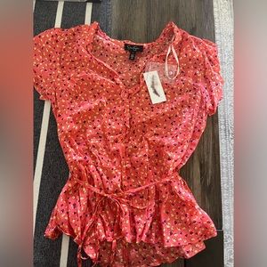 small colorful jessica’s simpson shirt